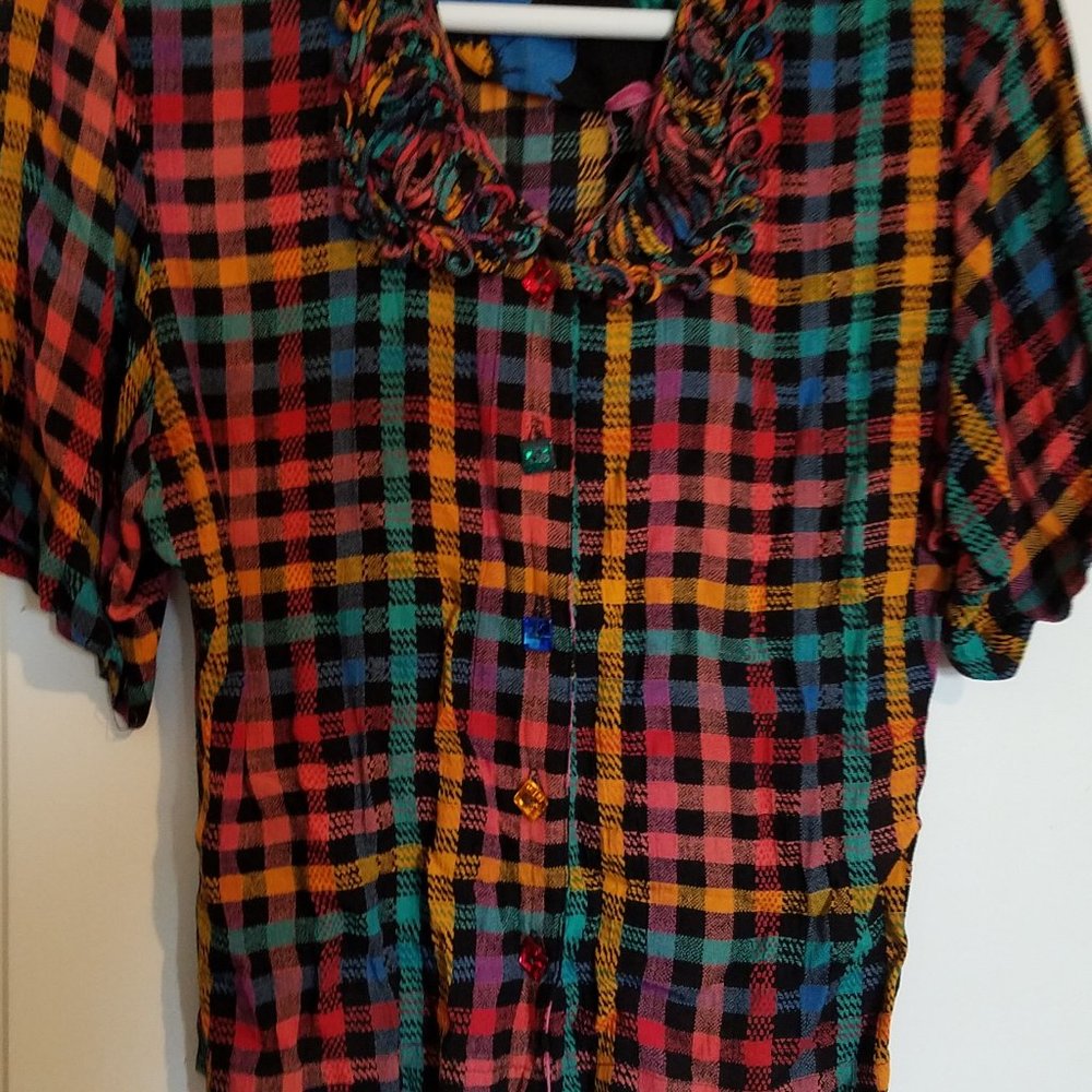 A unique blouse by a world-famous designer  Carole Little.